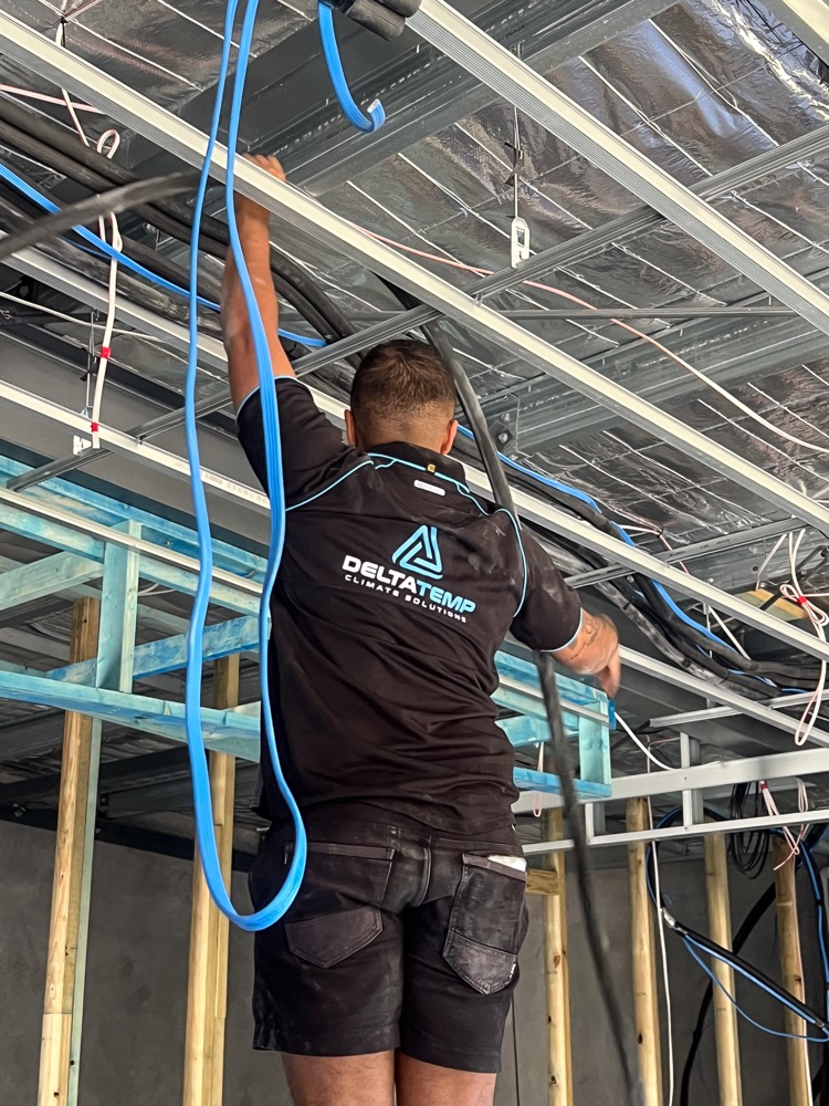 Running cabling and drains before the walls are lined