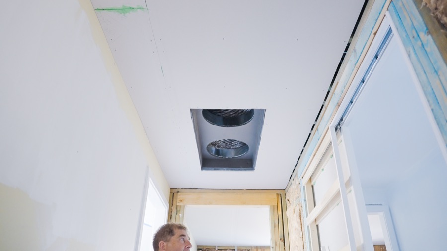 Ducted grille in the ceiling of a home during installation