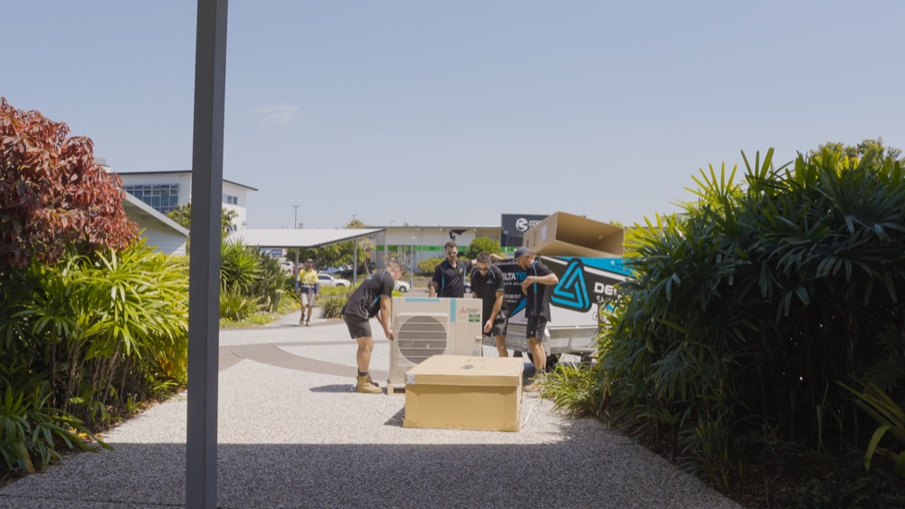 Outdoor units being placed in a complex courtyard